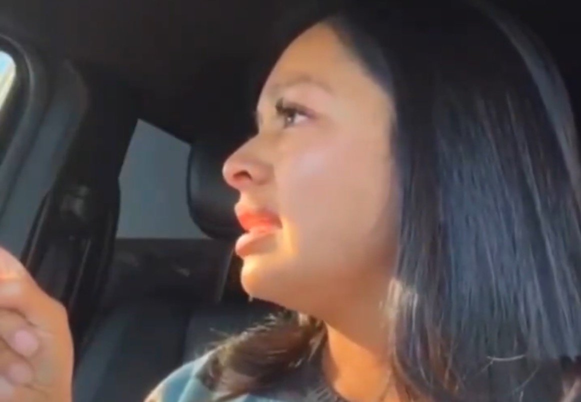 Protester livestreaming from car as law enforcement surrounds vehicle