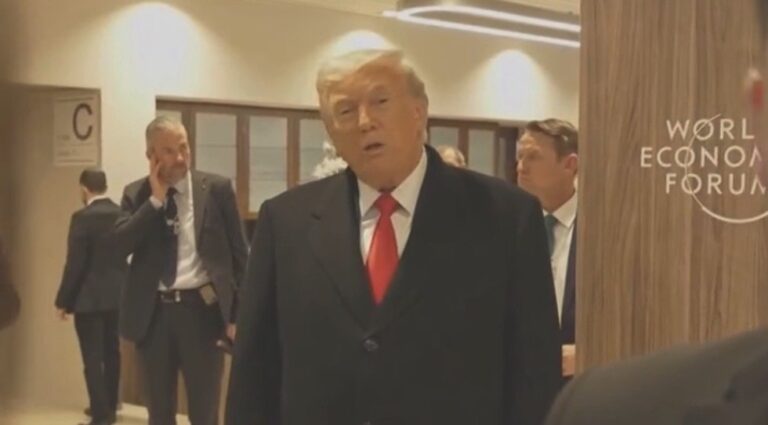President Trump speaking to reporters in Davos