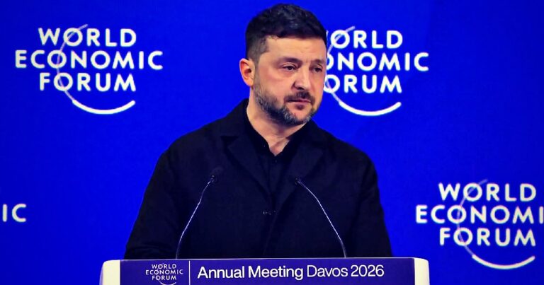 Zelensky speaking at Davos, with European leaders listening