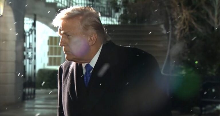 President Trump walking away from reporters on the South Lawn